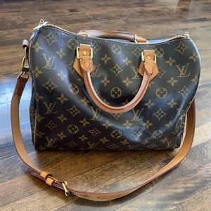 Sold—Authentic Speedy 30 bandouliere in monogram